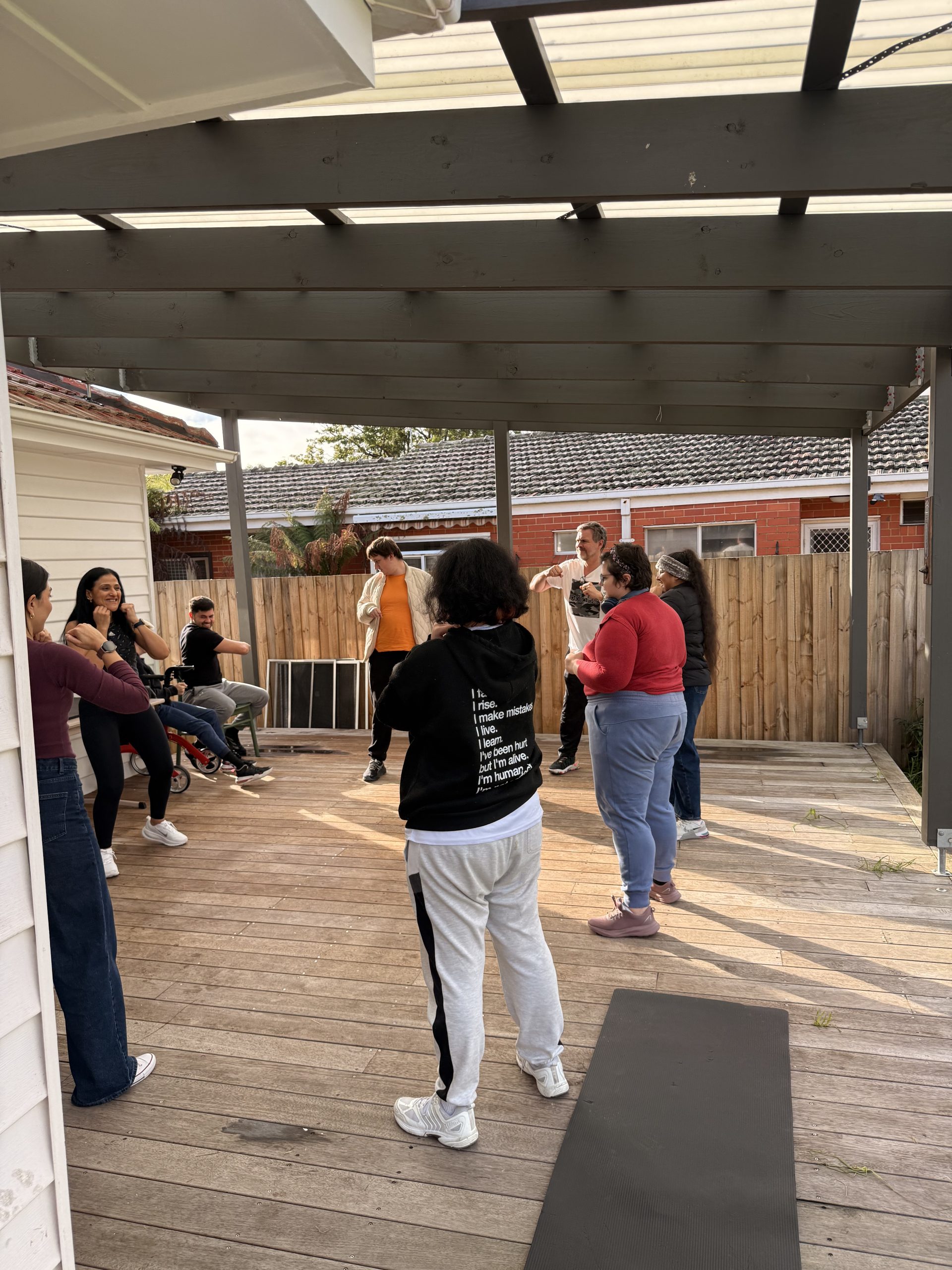 Participants relaxing during a wellness session at YAY Today in Ormond
